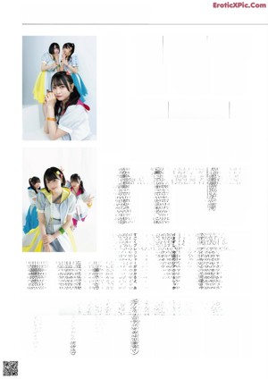 A group of young women sitting on top of a white box.
